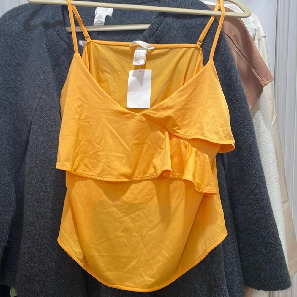 Orange strapless top